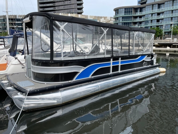 Runaway Bay Pontoon Boat. Tri hull.