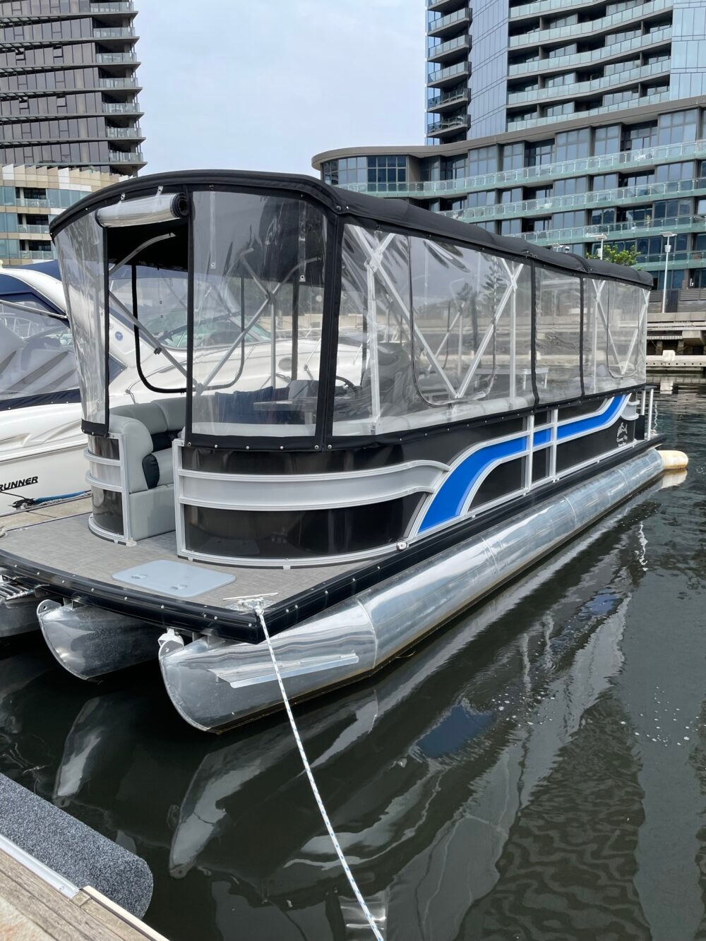 Runaway Bay Pontoon Boat. Tri hull.